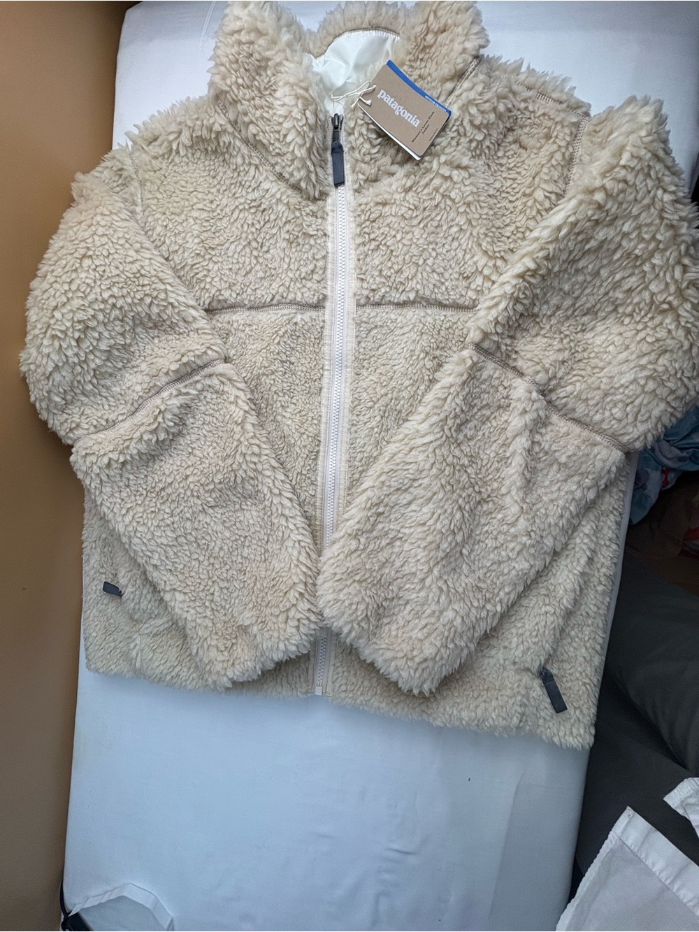 Patagonia women’s Cream Sherpa Puffer Jacket